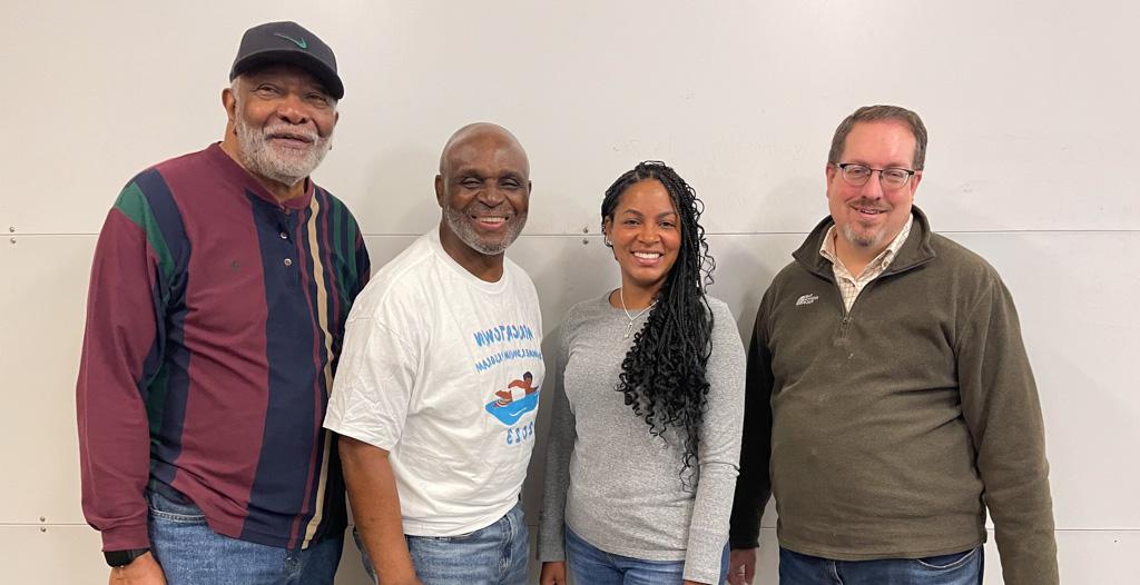 Dr. David Messenger, archaeologist Alexandra Jones, Mobile County Training Alumni Member Bill Green and President Anderson Flen.